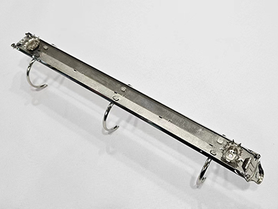 Mecanismo de anillas (remache tipo crisantemo)